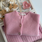 Cardigan laine losange rose poudre